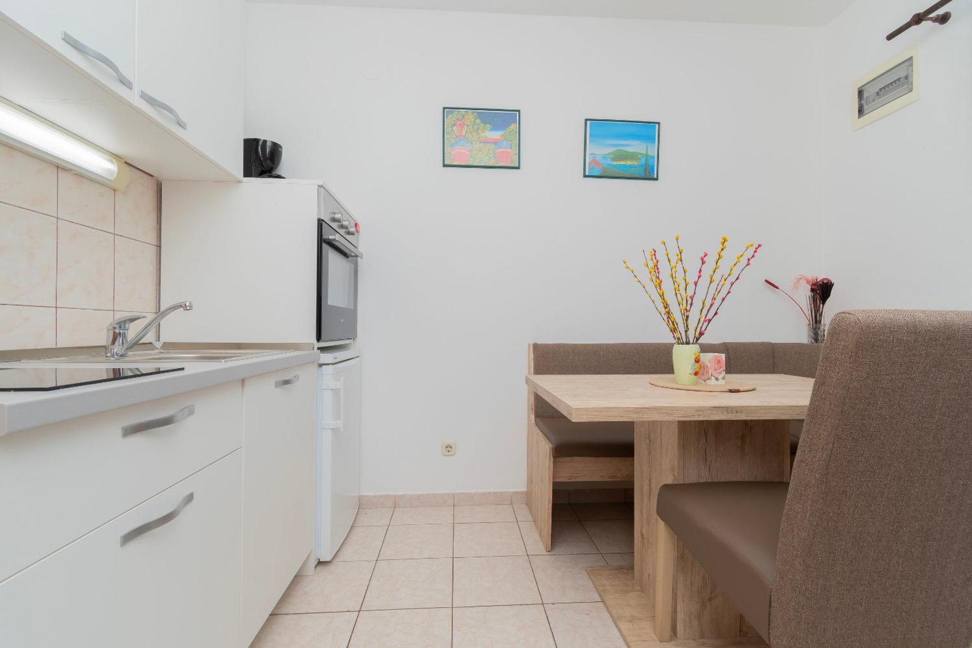 Apartments Toni Maslinica Extérieur photo
